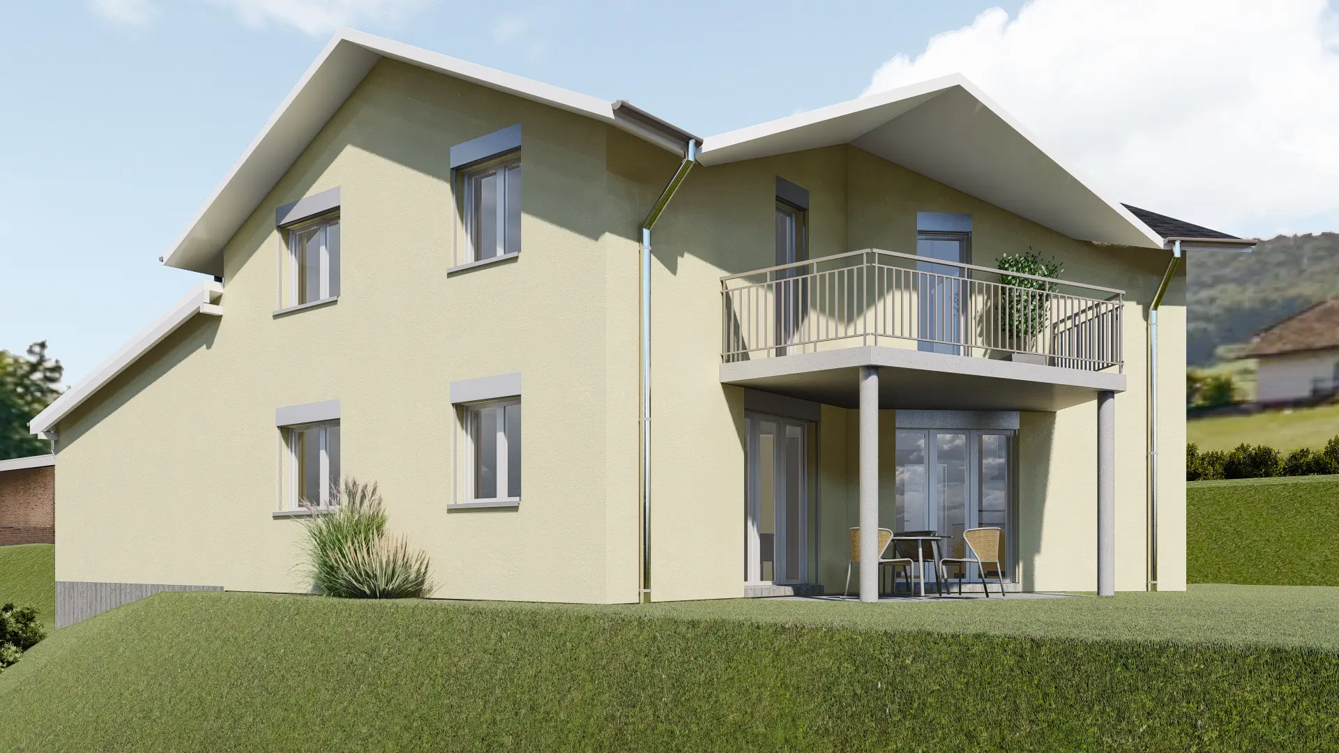 Gelbes Einfamilienhaus mit zwei Balkonen und Ausblick ins ländliche Umland